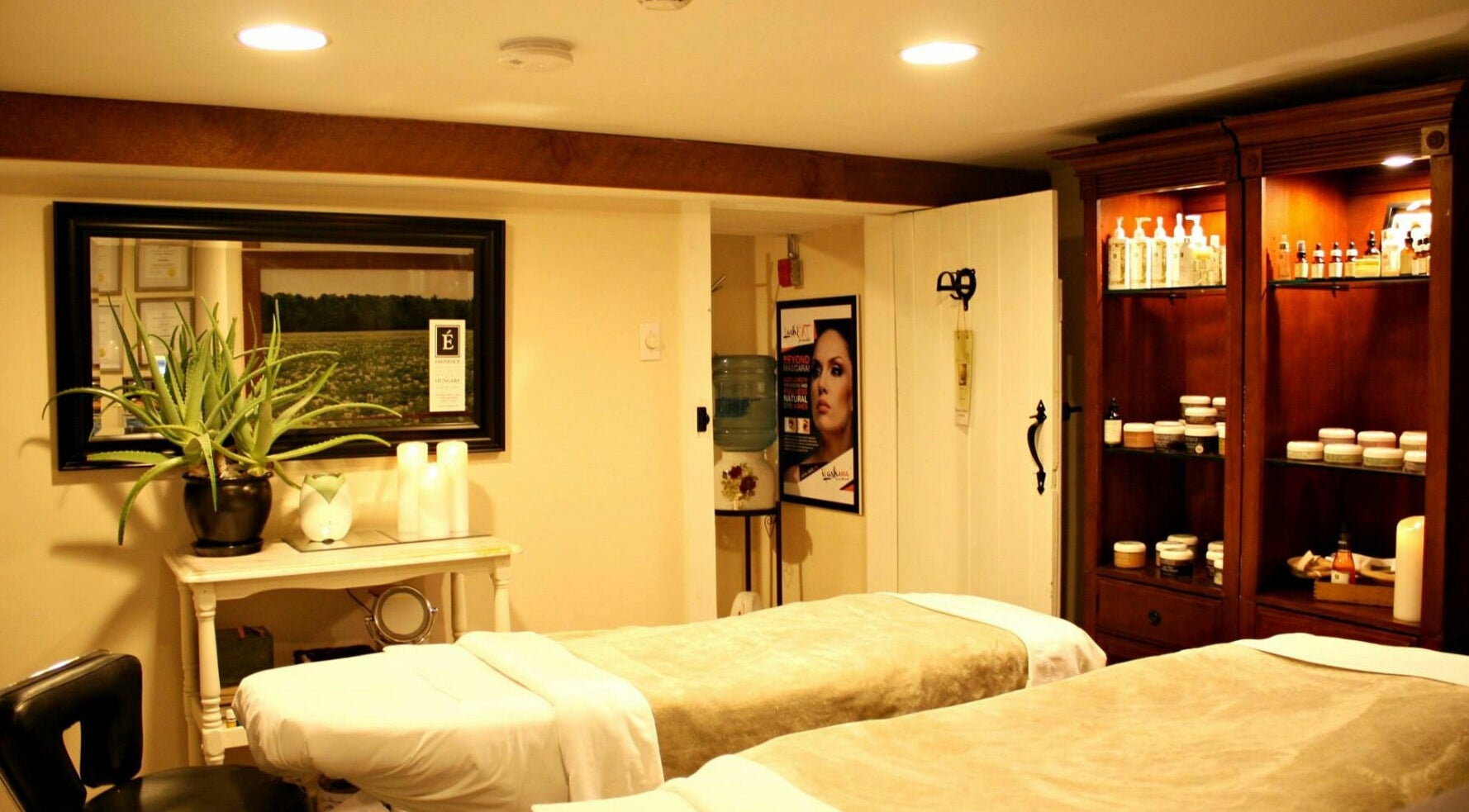 Relaxing massage room at Harvest Spa Stevenson Inn and Spa, Ontario, Ontario, CA, showcasing calm ambiance.