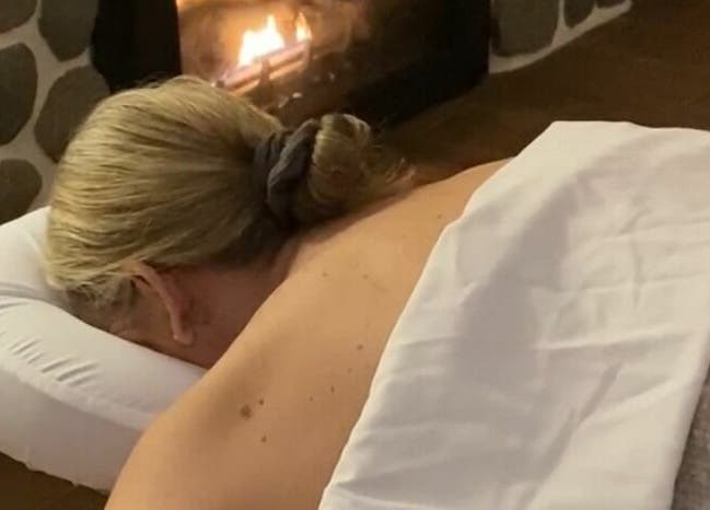 Relaxing massage by the fireplace at Harvest Spa Stevenson Inn and Spa, Ontario, Ontario, CA.