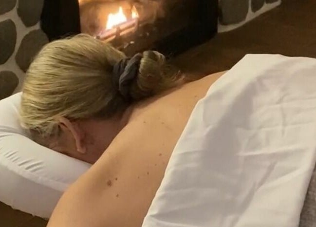 Relaxing massage by the fireplace at Harvest Spa Stevenson Inn and Spa, Ontario, Ontario, CA.
