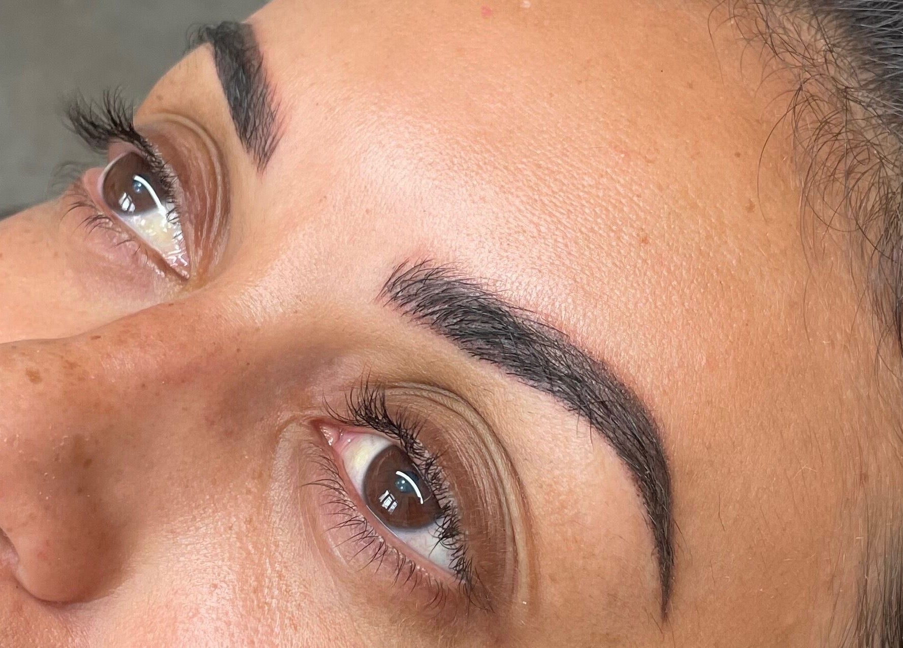 Close-up of perfectly shaped eyebrows done at Lux&co Beauty Bar in Cardiff, Wales, GB.
