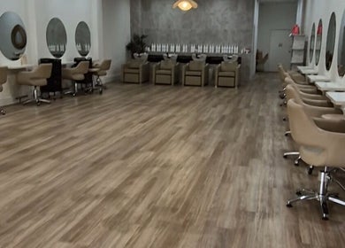 Spacious modern salon interior at Shh Beauty Secrets, Croydon, Victoria, AU, with stylish chairs and mirrors.