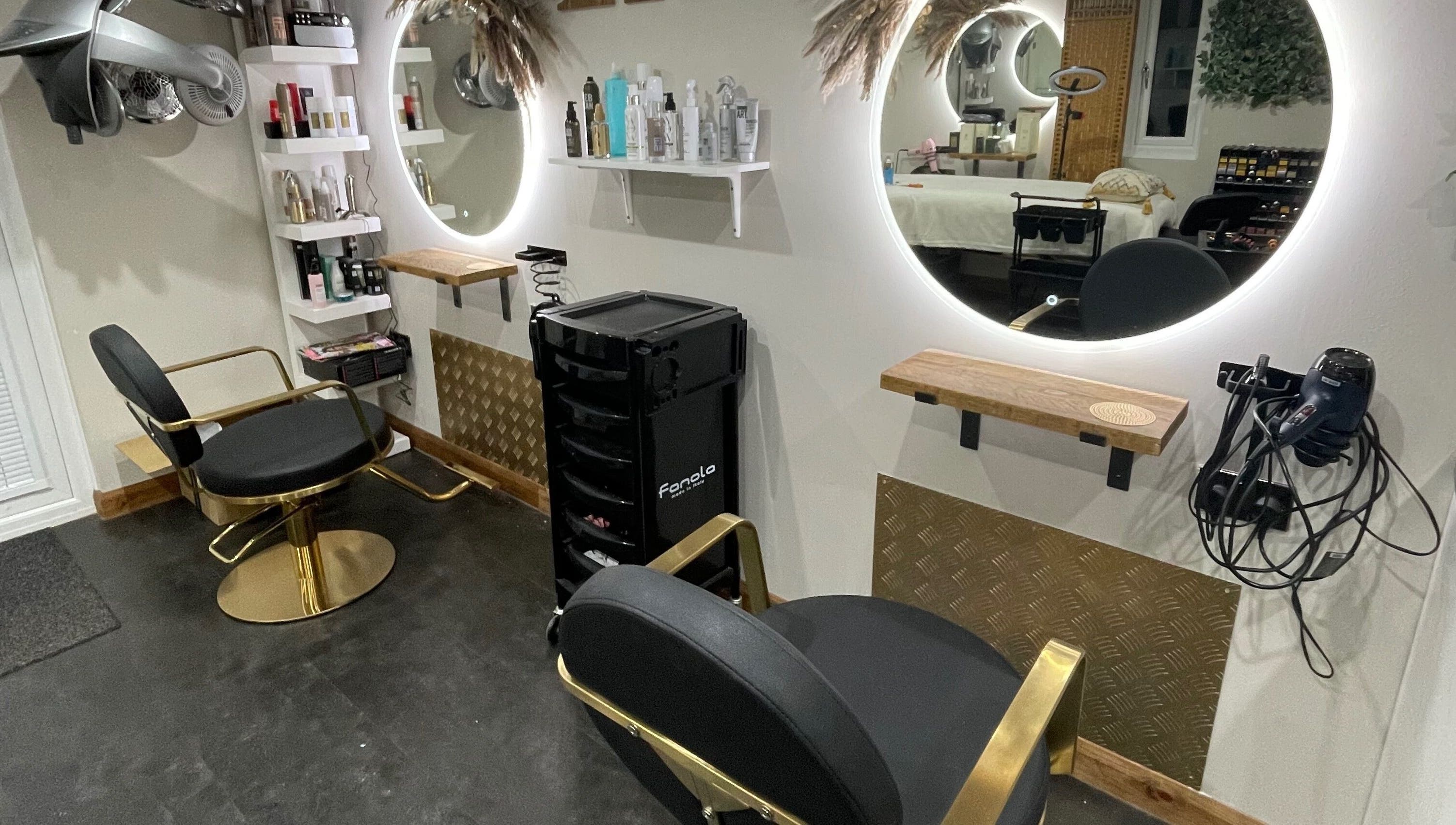 Ivory Hair by Franki in Rochester, England, GB features luxurious styling chairs and illuminated mirrors.