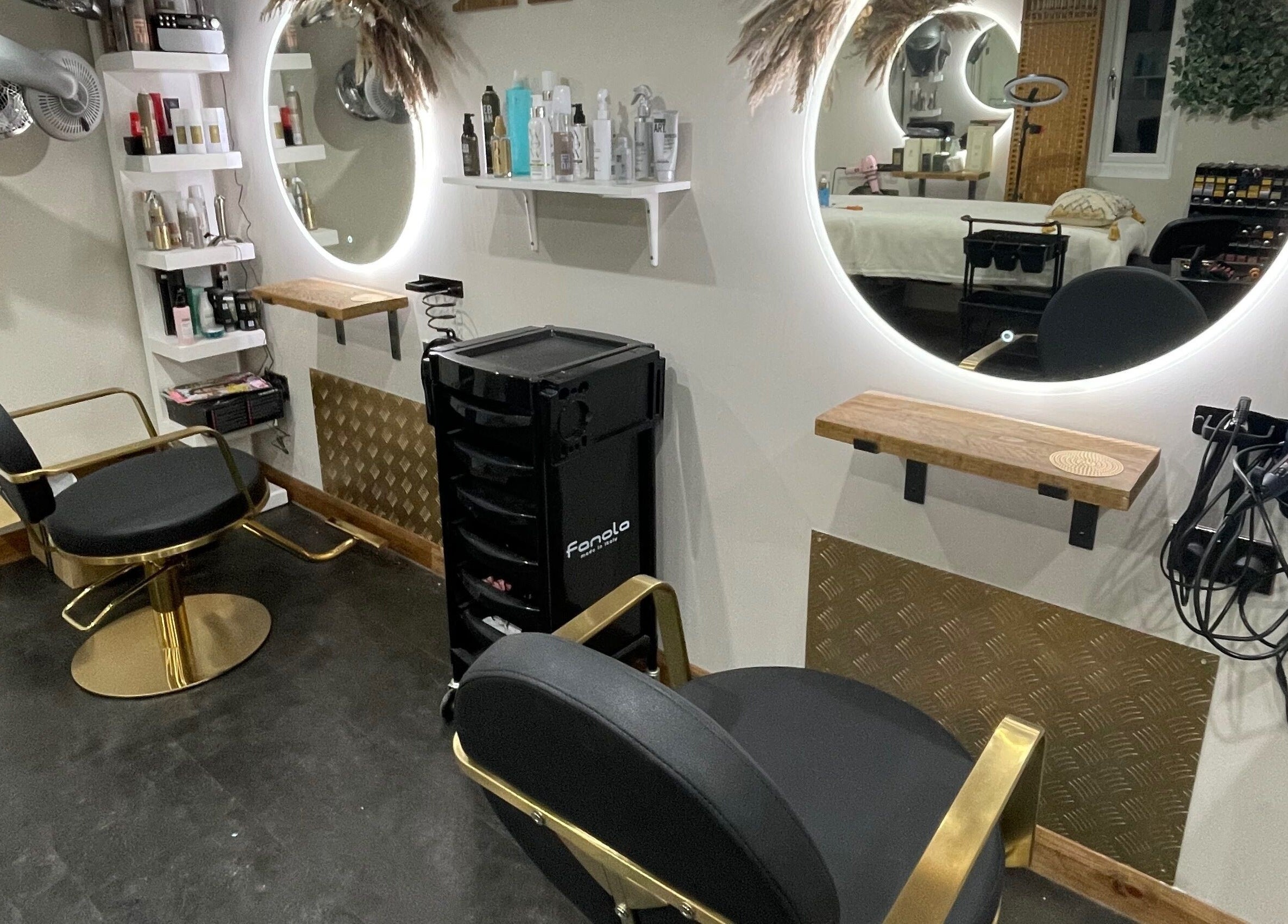 Ivory Hair by Franki in Rochester, England, GB features luxurious styling chairs and illuminated mirrors.