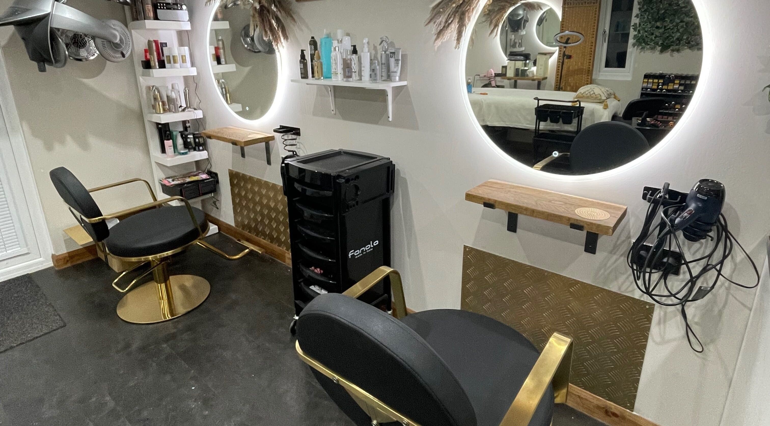 Ivory Hair by Franki in Rochester, England, GB features luxurious styling chairs and illuminated mirrors.