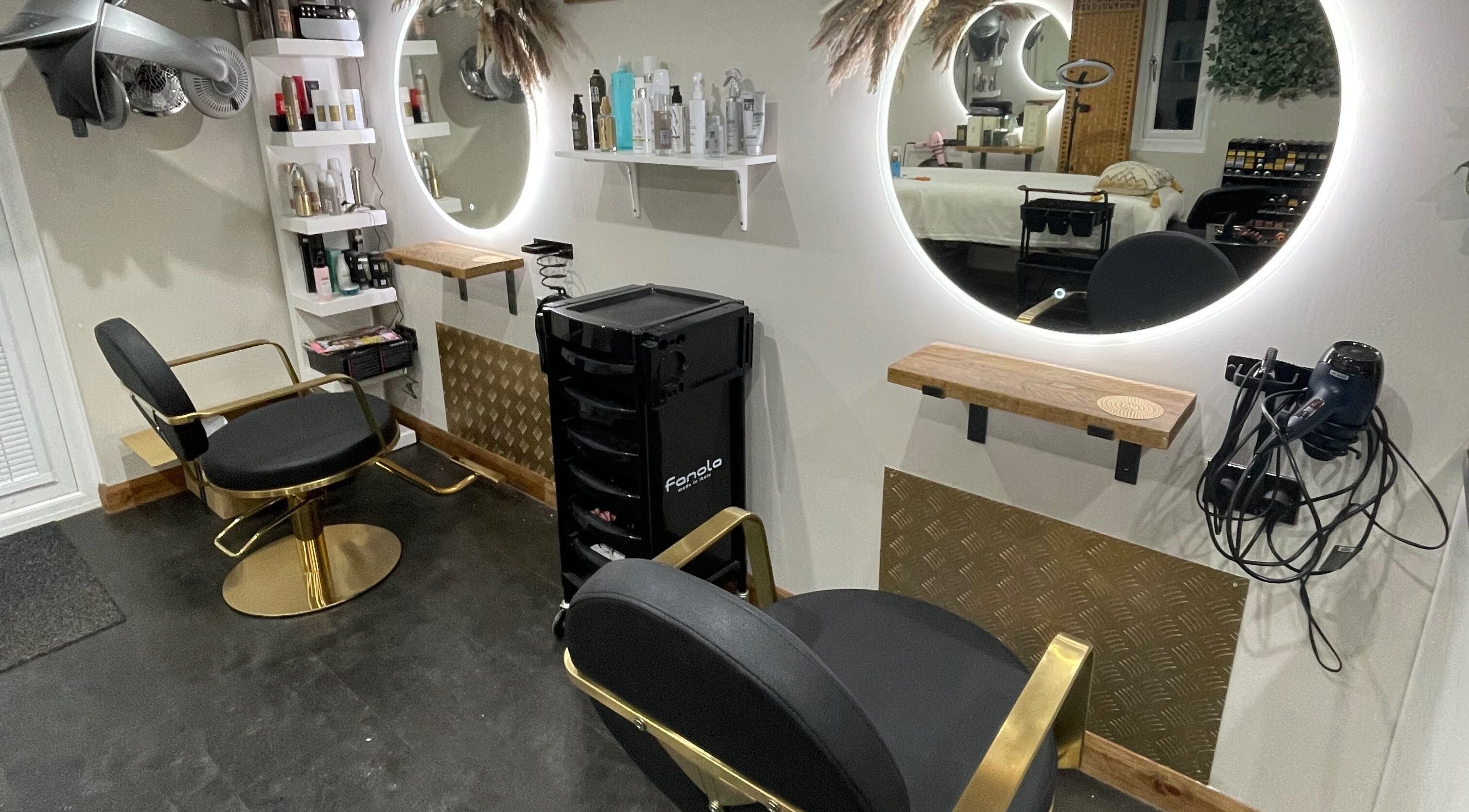 Ivory Hair by Franki in Rochester, England, GB features luxurious styling chairs and illuminated mirrors.
