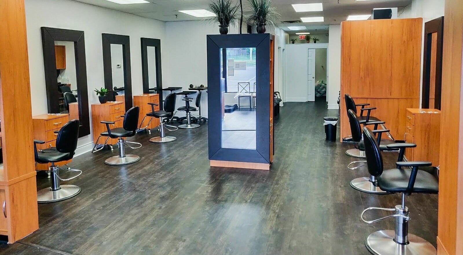 Modern interior of Hairworks Salon Mississauga in Mississauga, Ontario, CA showcasing sleek styling stations.