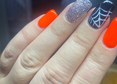 Vibrant Halloween-themed nail art at Nail Care by Claire, Tenterden, England, GB.
