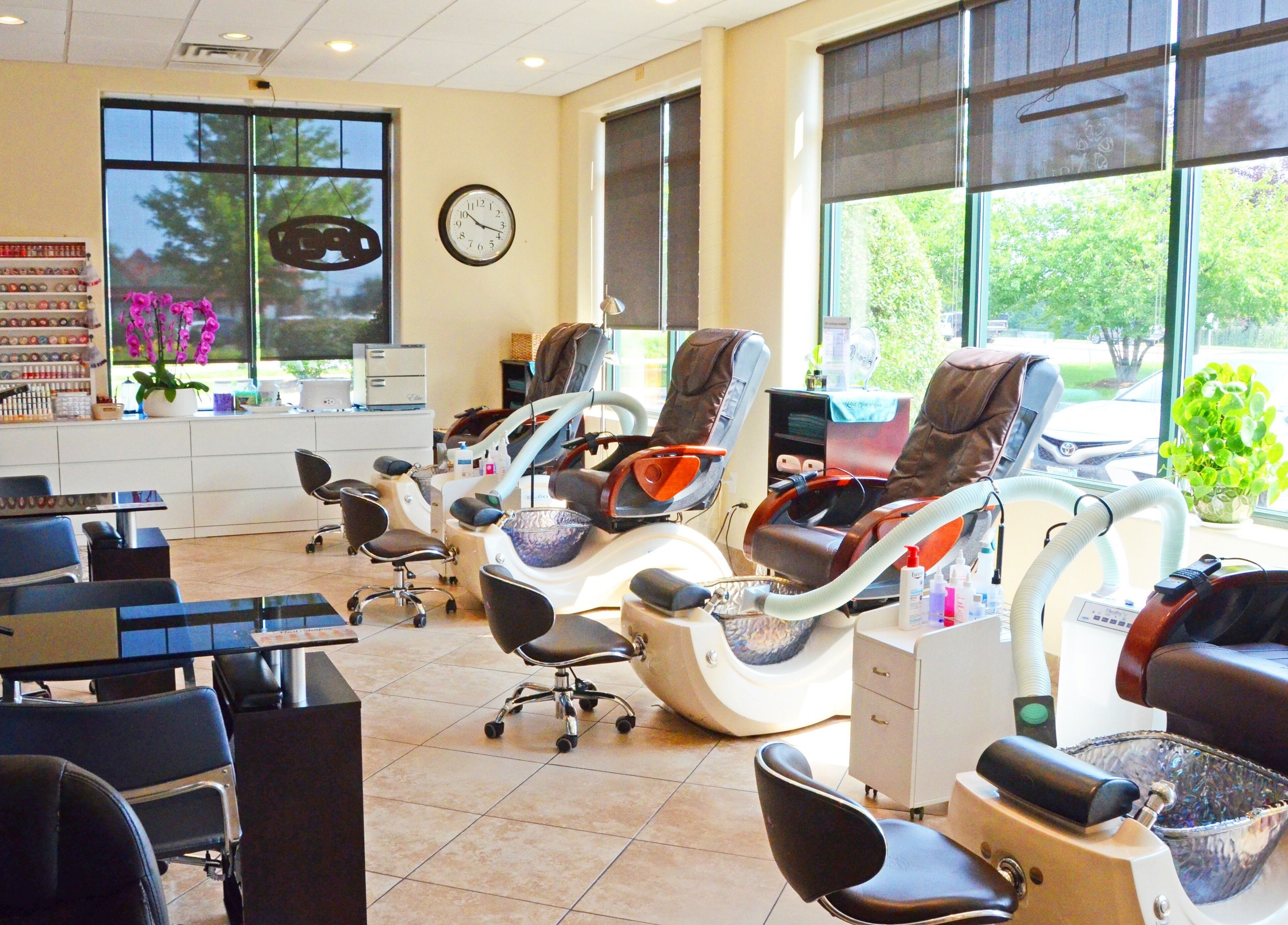 Relaxing pedicure stations at Red Sun Spa, Naperville, Illinois, US, offering a tranquil wellness environment.