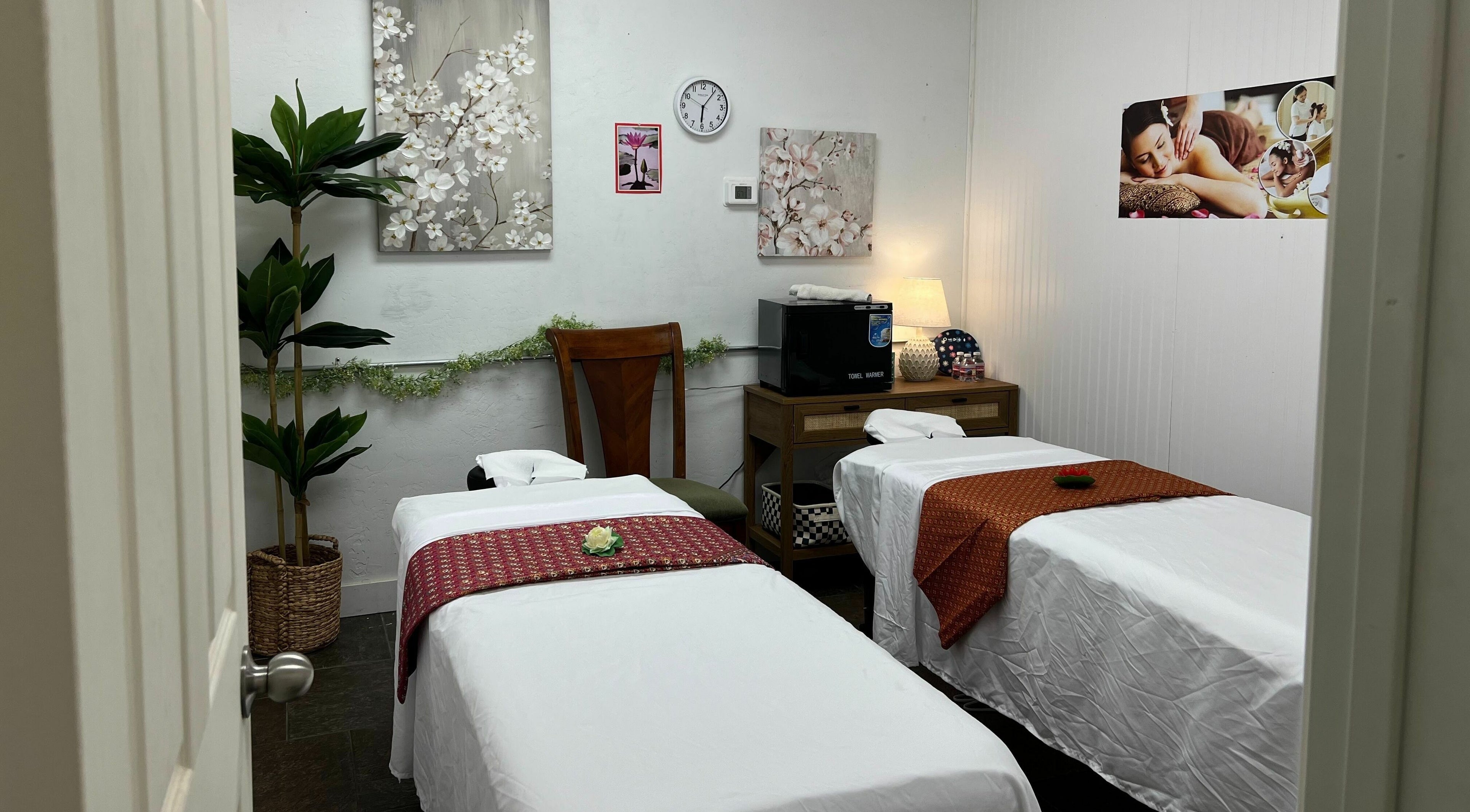 Calming massage room at Sawadee Thai Massage, Prescott Valley, Arizona, US with serene decor and twin massage tables.