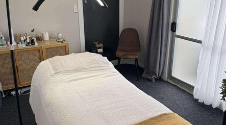 Tranquil treatment room at Haven Beauty, Taupō, Waikato, NZ with cozy bed and calming ambiance.