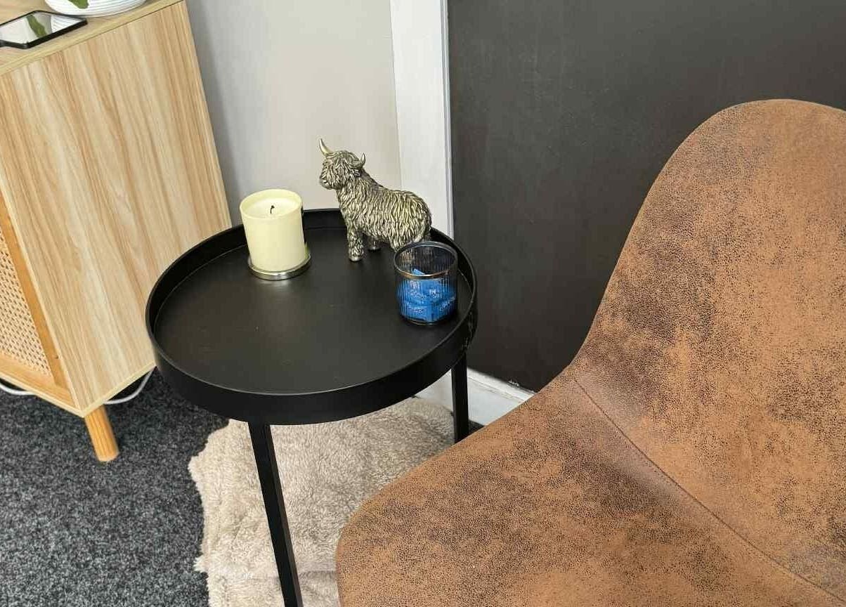 Rustic chair and decor at Haven Beauty, Taupō, Waikato, NZ, creating a warm and inviting atmosphere.