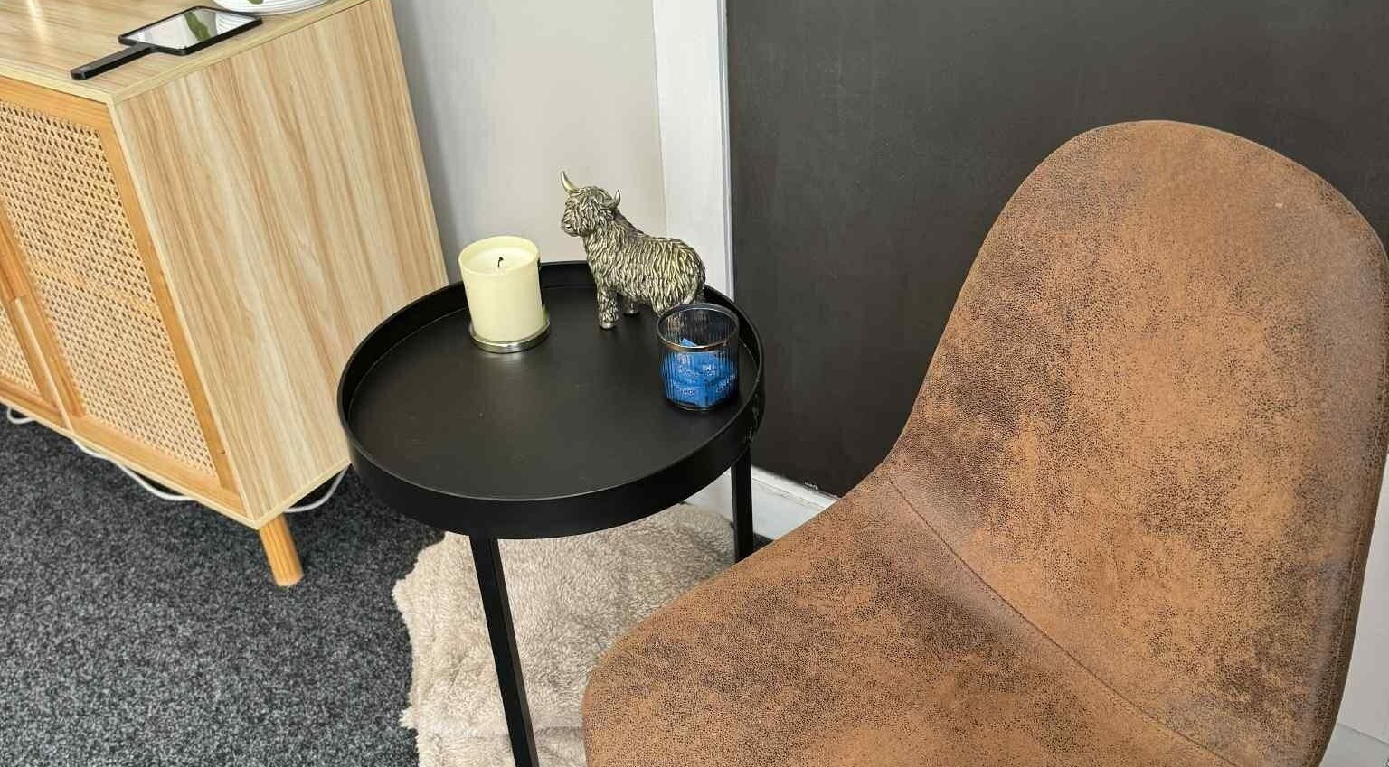 Rustic chair and decor at Haven Beauty, Taupō, Waikato, NZ, creating a warm and inviting atmosphere.