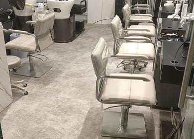 Interior of G Touch Hair Salon in Kowloon, HK showcasing stylish salon chairs and modern design.
