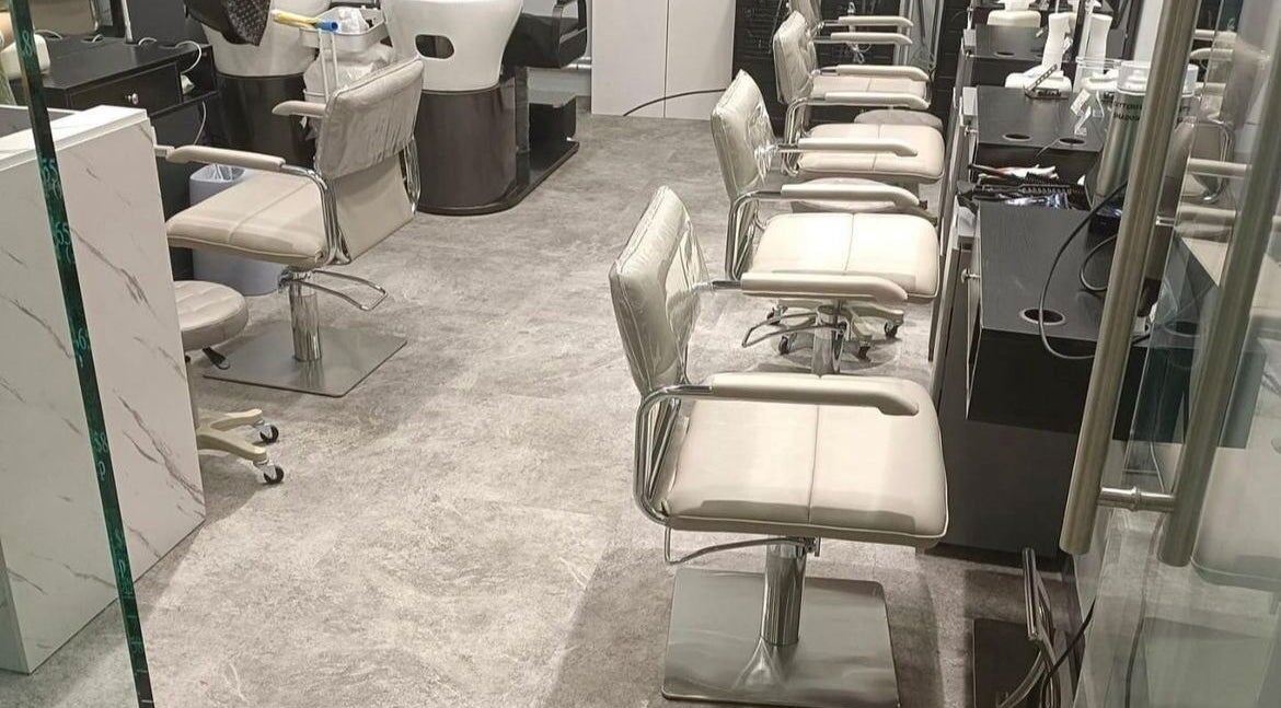 Interior of G Touch Hair Salon in Kowloon, HK showcasing stylish salon chairs and modern design.