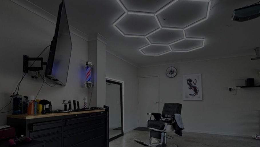 Chic barber room at Vision Studio, Coomera, Queensland, AU with stylish lighting and barber chair.