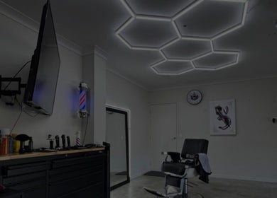 Chic barber room at Vision Studio, Coomera, Queensland, AU with stylish lighting and barber chair.