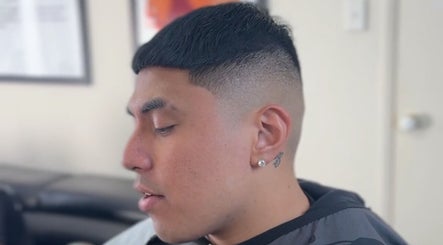 Close-up of a modern haircut at Vision Studio, Coomera, Queensland, AU, showcasing a clean fade and side profile.