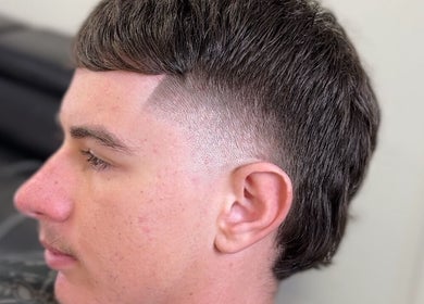 Close-up of a fresh haircut at Vision Studio, Coomera, Queensland, AU showcasing sharp styling and texture.