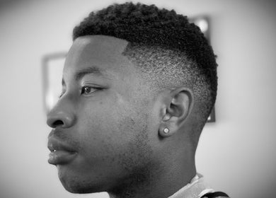 Profile view of a stylish fade haircut at Vision Studio, Coomera, Queensland, AU.