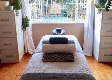 Relaxing massage room at Sharn - Massage Therapist in CAPE TOWN, Western Cape, ZA with cozy ambiance.
