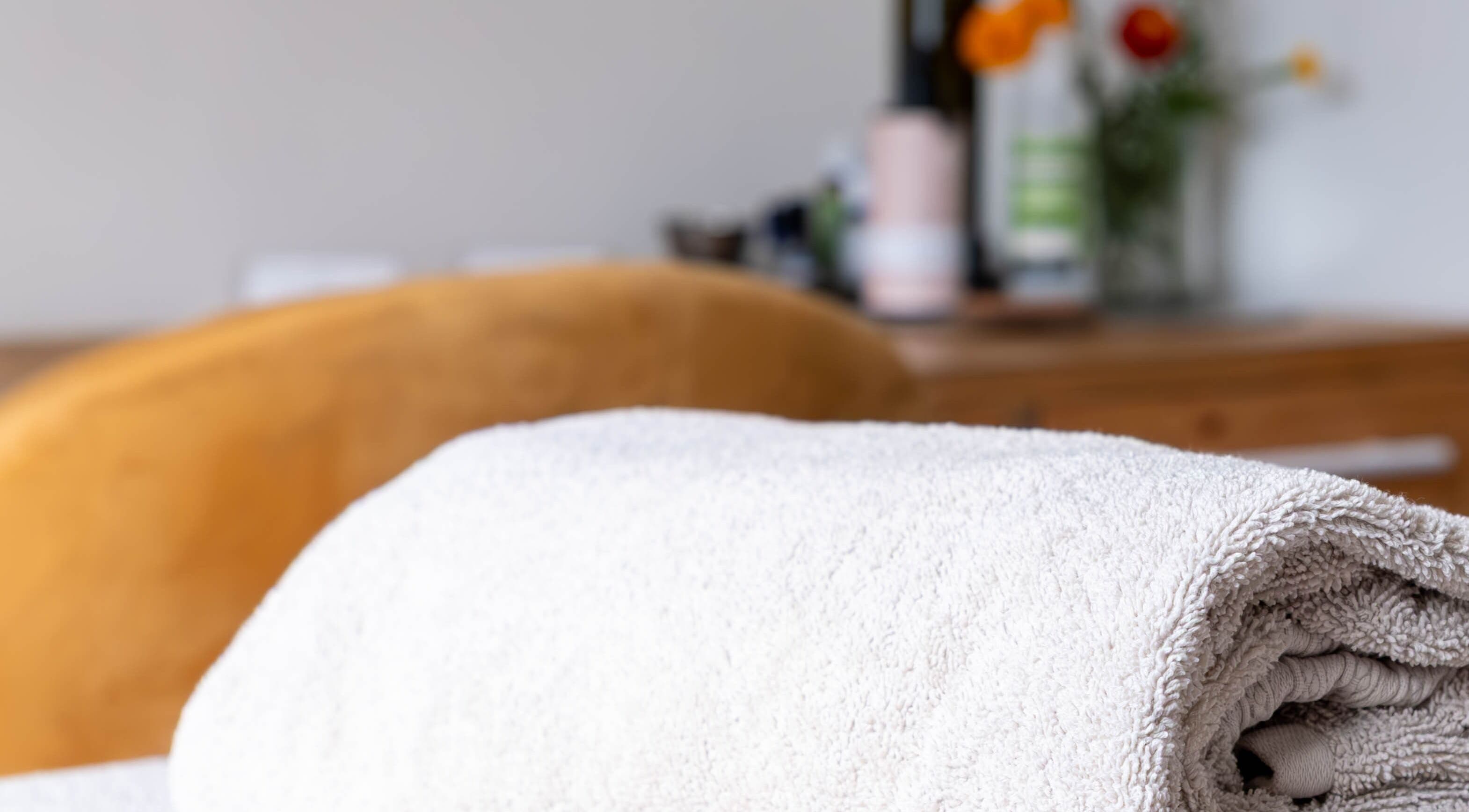 Soft towels at Sharn - Massage Therapist, Cape Town, Western Cape, ZA, create a serene atmosphere for relaxation.