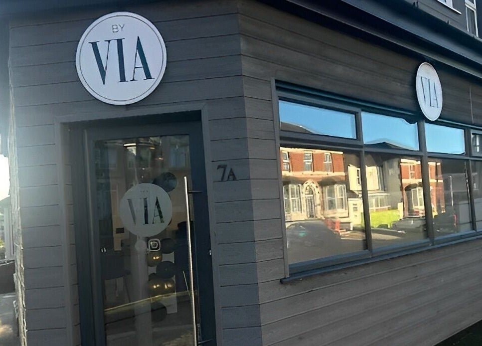 Exterior of By Via beauty venue on a sunny day in Blackpool, England, GB, showcasing modern design.