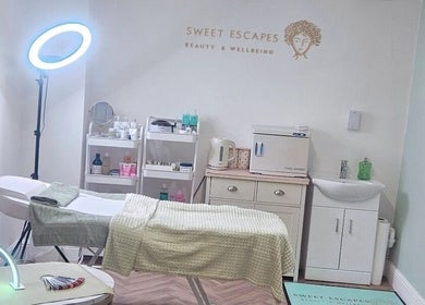 Calming treatment room at Sweet Escapes Beauty & Wellbeing in Rolleston-on-Dove, England, GB.