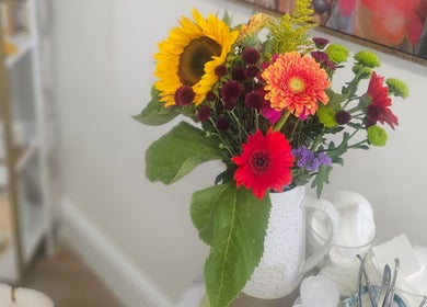 Vibrant floral arrangement at Sweet Escapes Beauty & Wellbeing, Rolleston-on-dove/Stretton, England, GB.
