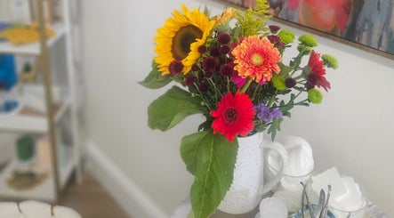 Vibrant floral arrangement at Sweet Escapes Beauty & Wellbeing, Rolleston-on-dove/Stretton, England, GB.