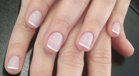 French manicure at Sweet Escapes Beauty & Wellbeing, Rolleston-on-dove, England, GB showcasing intricate nail art.