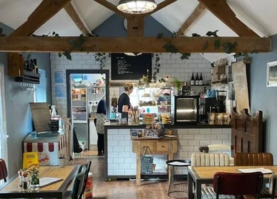 Warm and inviting café interior at Sweet Escapes Beauty & Wellbeing, Rolleston-on-dove, England, GB.