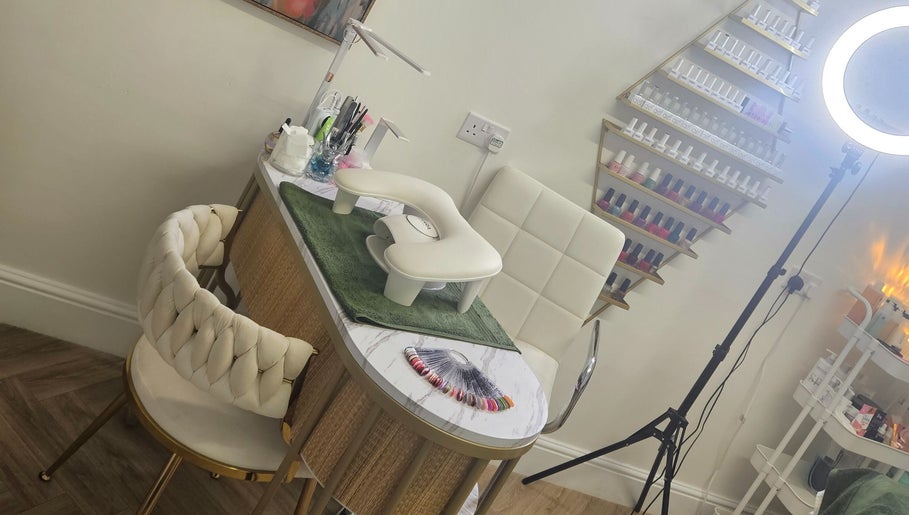 Elegant nail station at Sweet Escapes Beauty & Wellbeing, Rolleston-on-dove, England, showcasing manicure essentials.