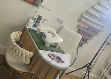 Elegant nail station at Sweet Escapes Beauty & Wellbeing, Rolleston-on-dove, England, showcasing manicure essentials.