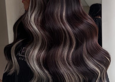 Elegant wavy hair styling at Katie at Outback, Dunfermline, Scotland, GB, capturing the essence of luxury.