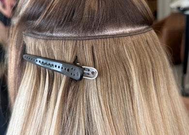Close-up of hair extensions applied at Katie at Outback, Dunfermline, Scotland, GB.