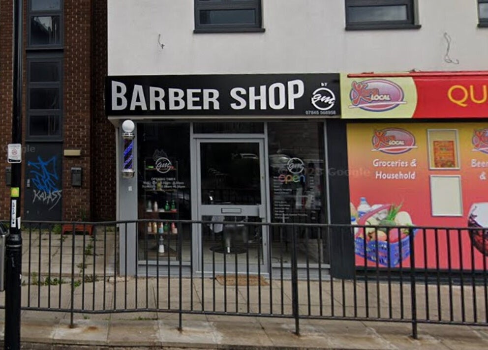 Entrance of Fade and Blade, a chic barber shop in Coventry, England, GB.