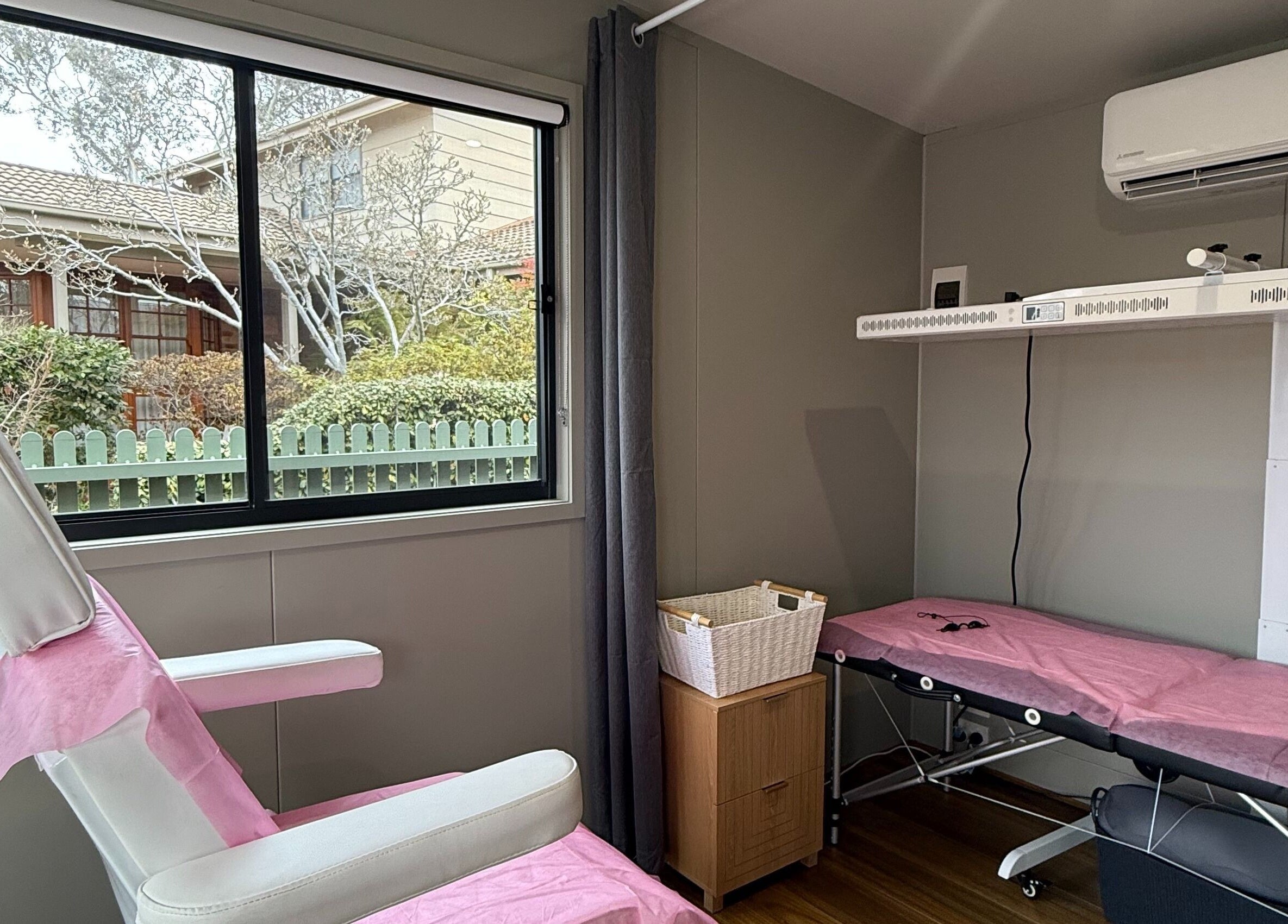 Cozy beauty room with pink accents at Lorraine Lorzano Artistry in Downer, Australian Capital Territory, AU.