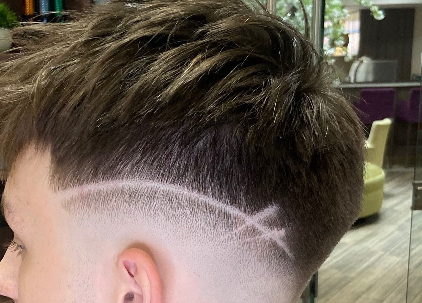 Close-up of trendy haircut at Jay’s Barbering at Beaujolais Hair, Dunstable, England, GB.