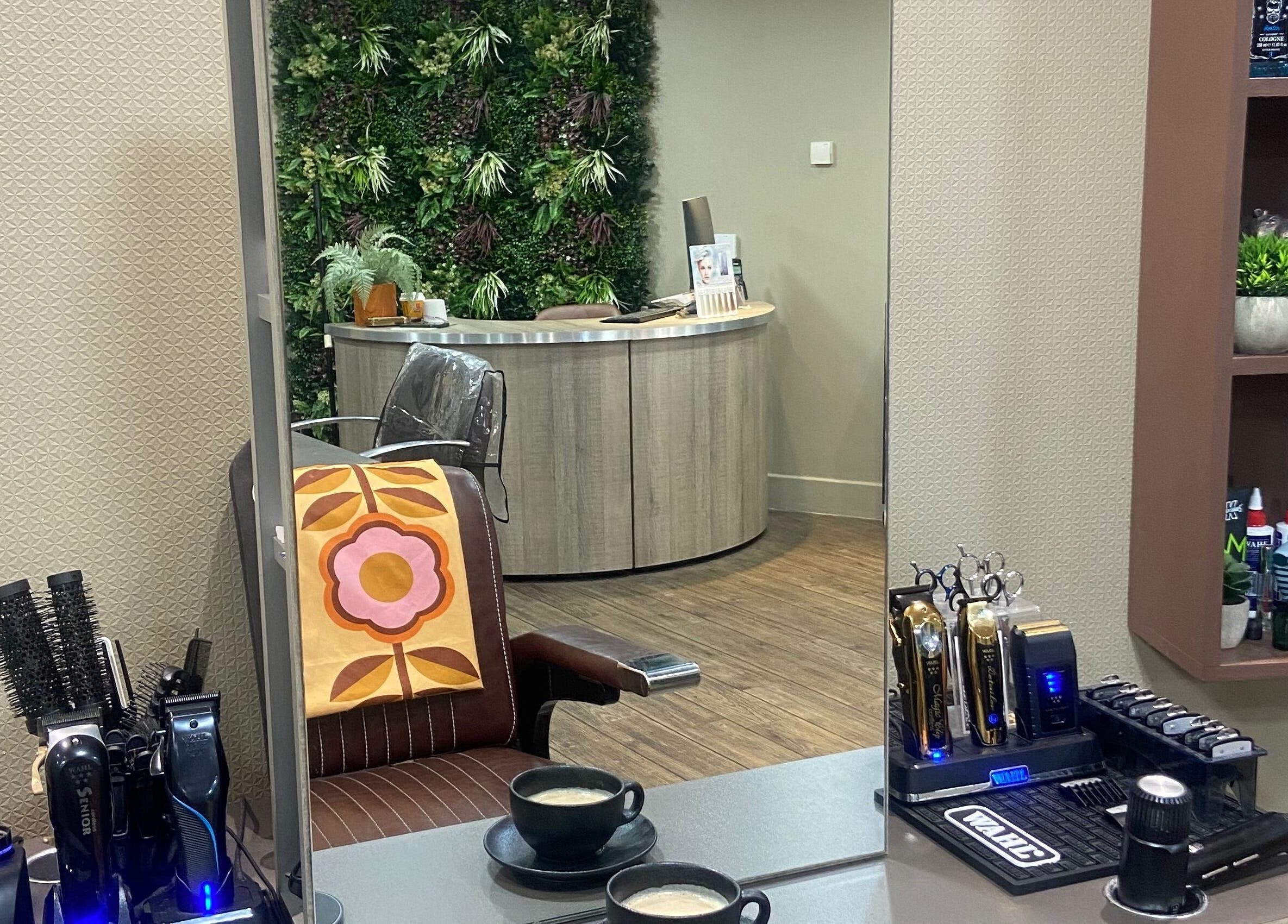 Modern barber station at Jay's Barbering at Beaujolais Hair, Dunstable, England, GB with chic interior.