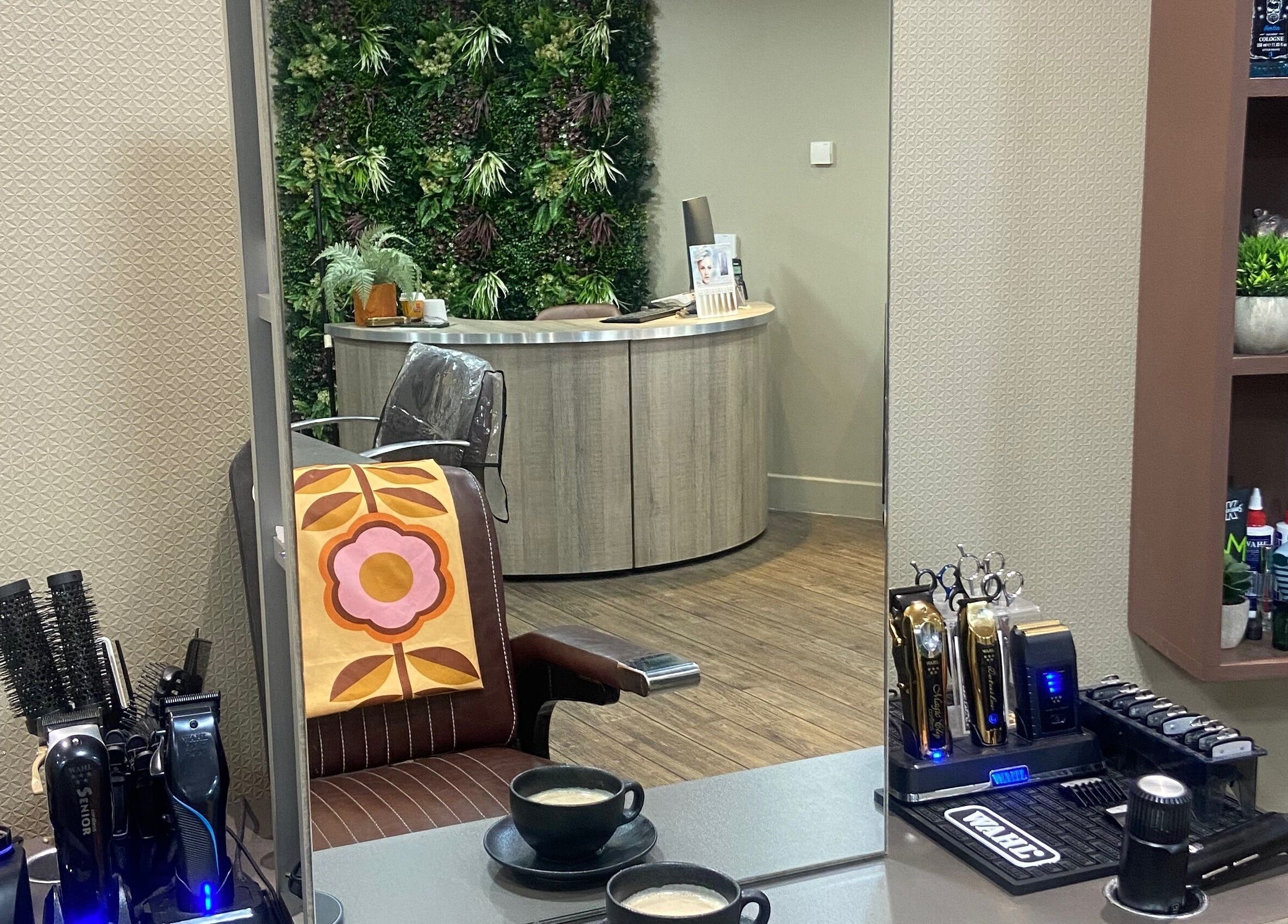 Modern barber station at Jay's Barbering at Beaujolais Hair, Dunstable, England, GB with chic interior.