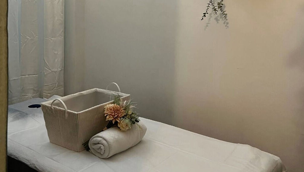 Relaxing treatment room at Thai Oasis Lifestyle Massage & Spa in Stanmore, New South Wales, AU with soothing decor.