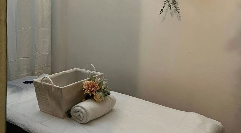 Relaxing treatment room at Thai Oasis Lifestyle Massage & Spa in Stanmore, New South Wales, AU with soothing decor.