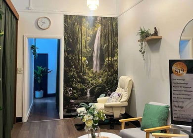 Relaxing spa room at Thai Oasis Lifestyle Massage & Spa in Stanmore, New South Wales, AU with lush decor.