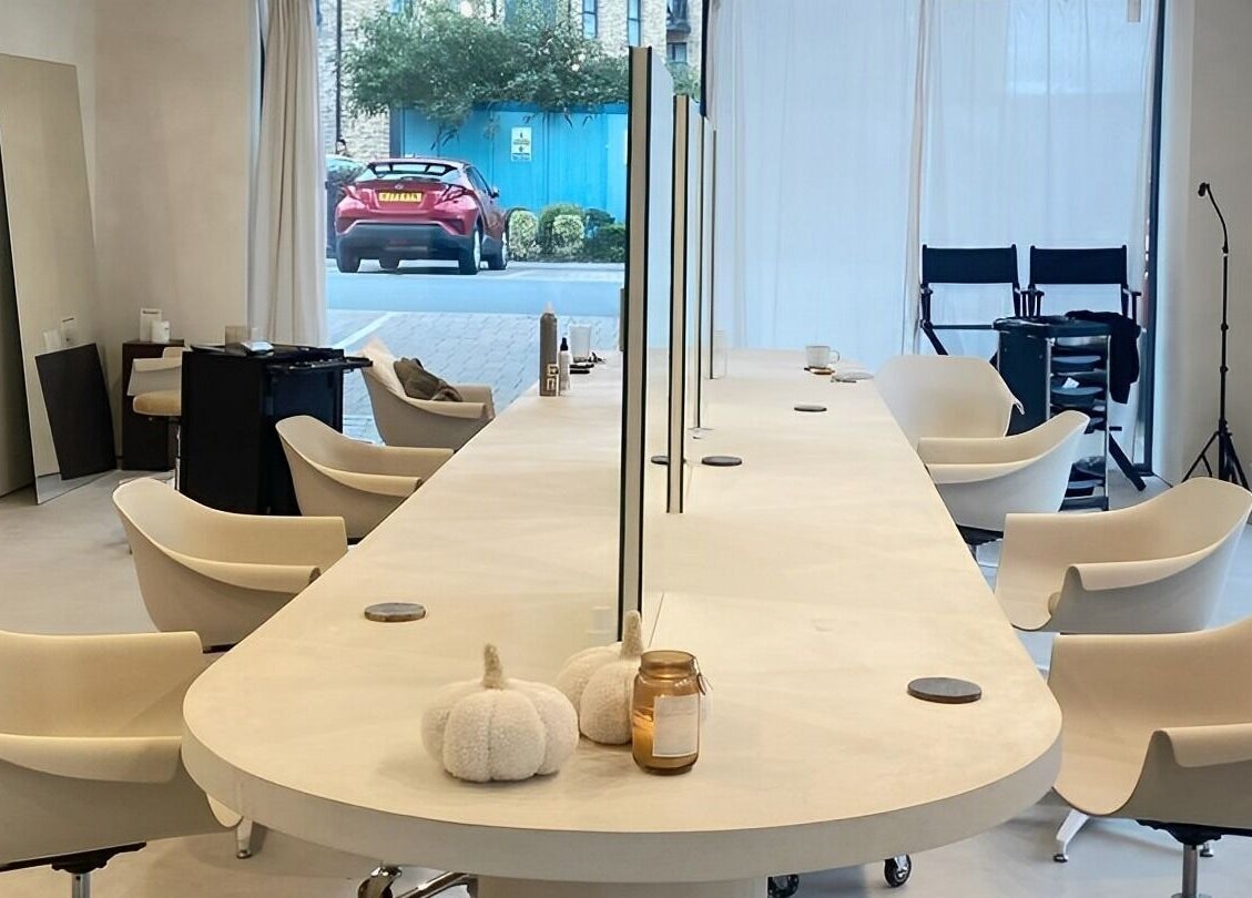 Modern beauty treatment area at ZJB Lashes in Southampton, England, GB, featuring sleek chairs and minimalist decor.