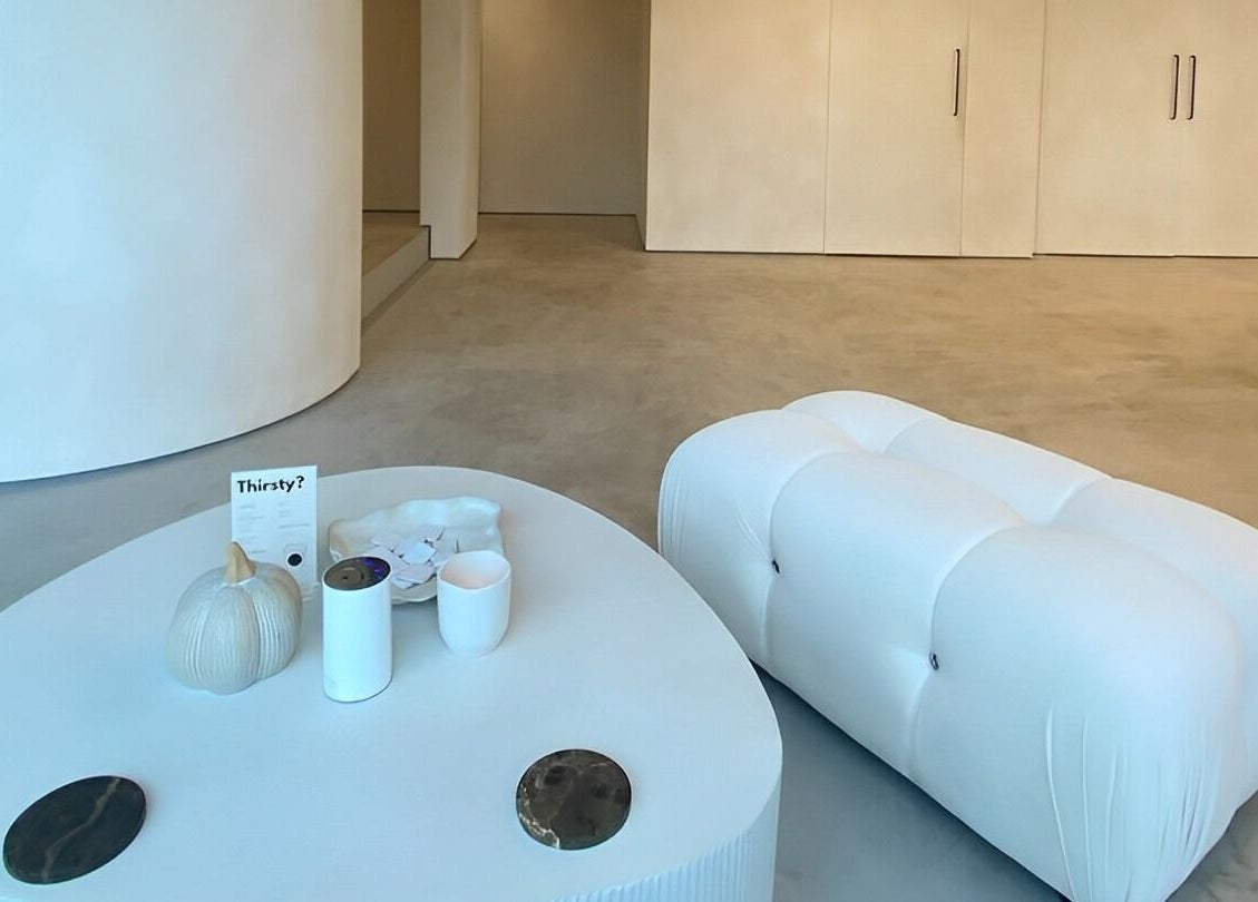 Modern waiting area at ZJB Lashes in Southampton, England, GB with chic white furnishing.
