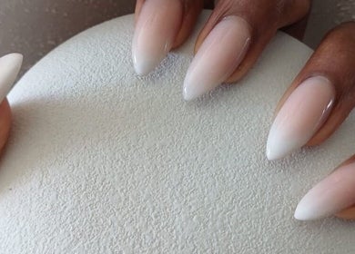 Elegant nude ombre nails at Jasmine Beauty and Wellness, Midrand, Gauteng, ZA, showcasing sophisticated nail design.
