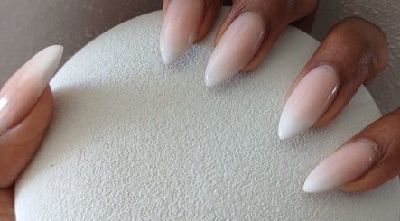 Elegant nude ombre nails at Jasmine Beauty and Wellness, Midrand, Gauteng, ZA, showcasing sophisticated nail design.