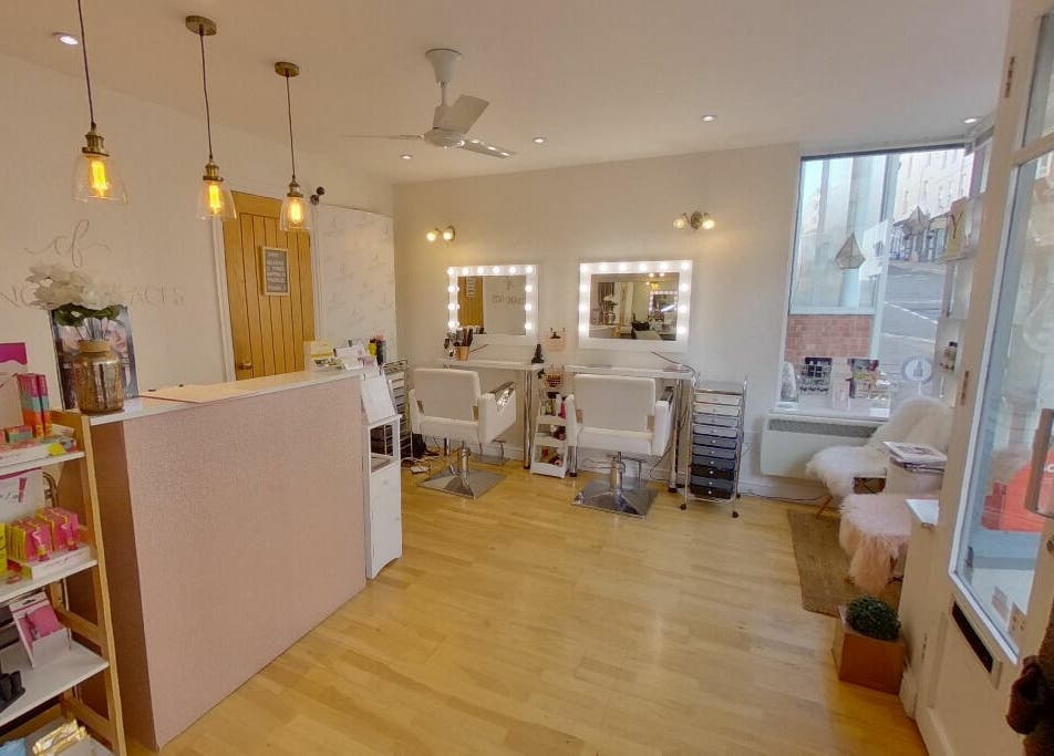 Elegant interior of Changing Faces Studio in Exeter, England, GB with chic decor and beauty stations.