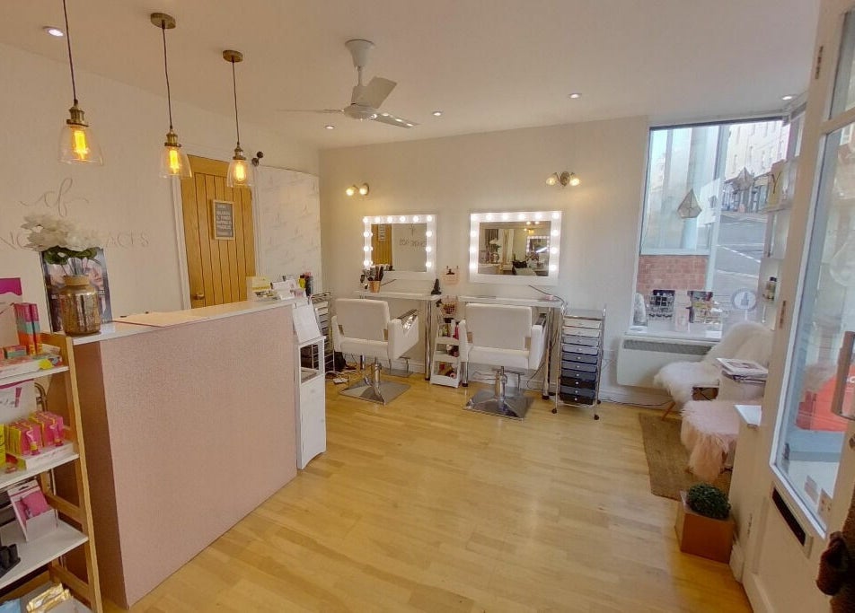 Elegant interior of Changing Faces Studio in Exeter, England, GB with chic decor and beauty stations.