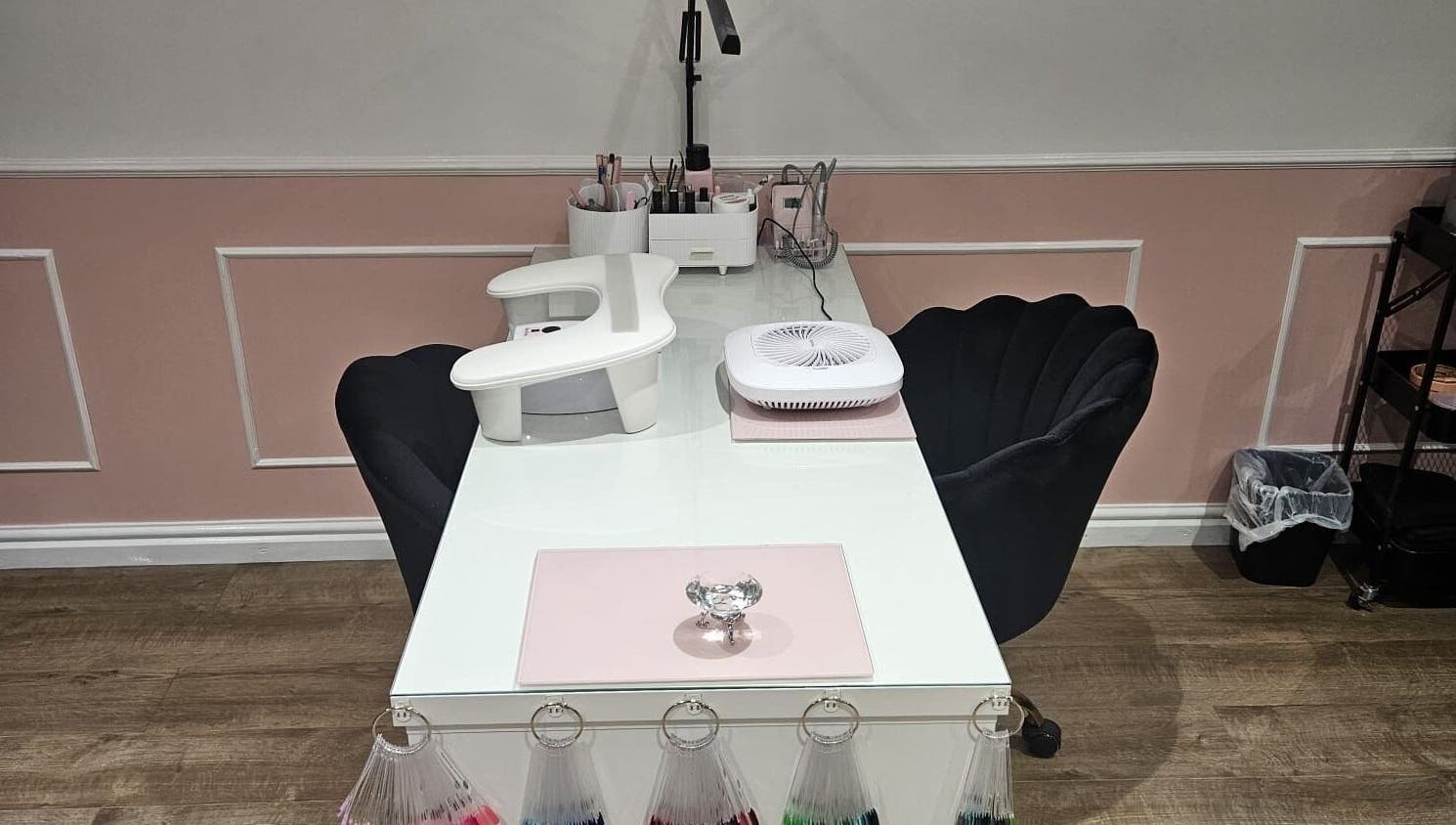 Elegant nail station at Precious Beauty in Hull, England, GB with stylish decor and nail tools.